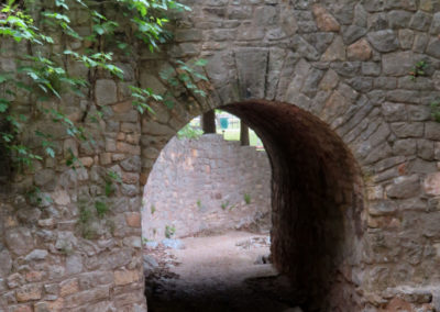 arched underpass through stone bridge austin, tx